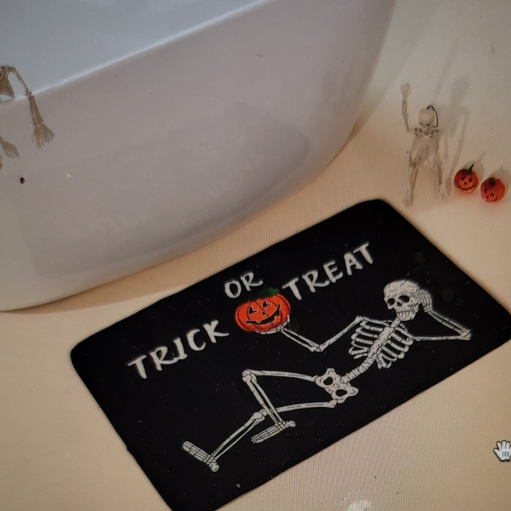 Halloween Skeleton Trick or Treat bath mat.  19 x 31.  Non slip washable